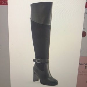 Heeled tall boot